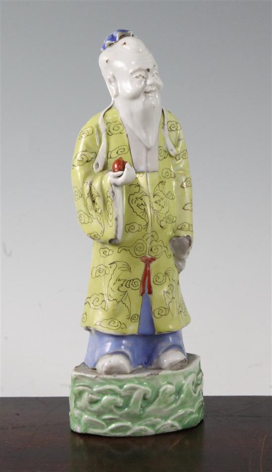 A Chinese enamelled porcelain figure of Shou Lao, 18th/19th century, height 22cm